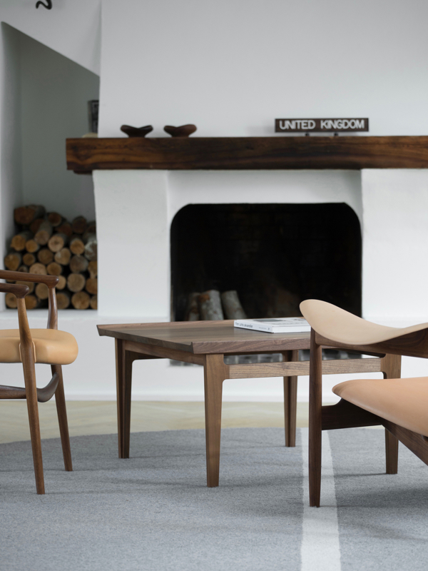 The 500 Table in walnut.
