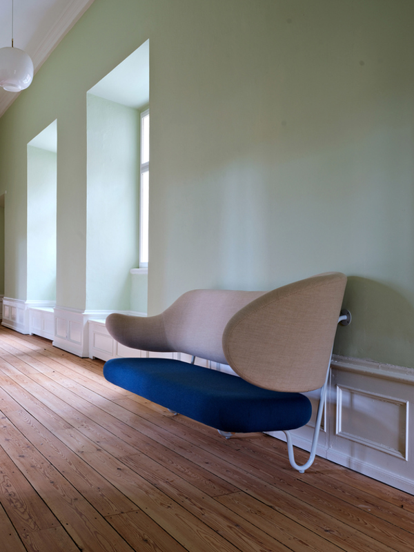 The Wall Sofa with 'Remix' upholstery in the colour '113' on the back and 'Divina' upholstery in the colour '791' on the seat.