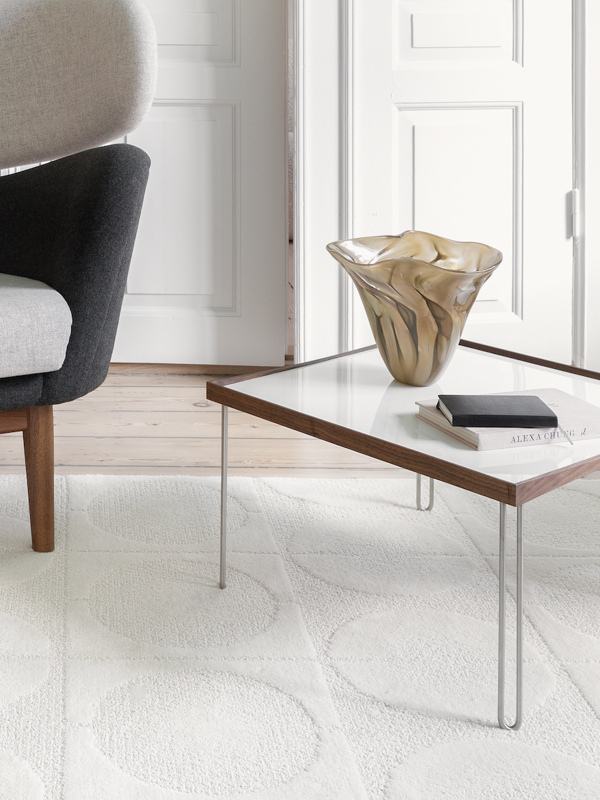 The Tray Table in walnut with white high gloss laminate tabletop.