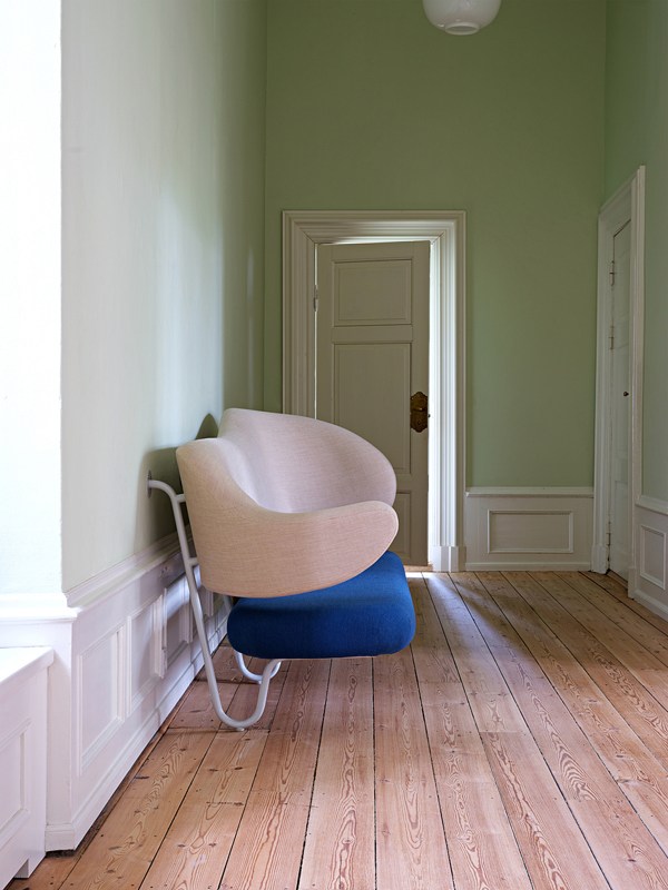 The Wall Sofa with 'Remix' upholstery in the colour '113' on the back and 'Divina' upholstery in the colour '791' on the seat.