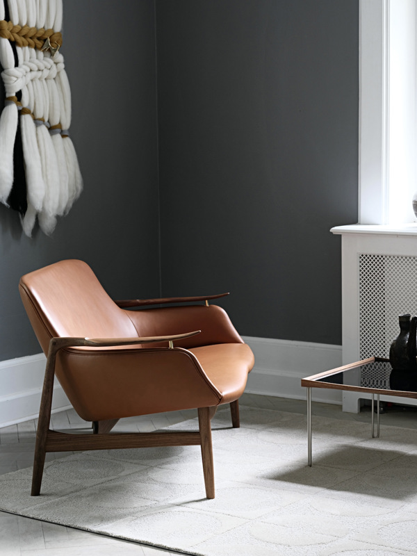  The 53 Sofa in walnut with 'Vegetal' leather upholstery in the colour '95'.