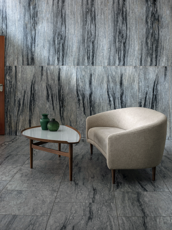 The Little Mother Sofa with walnut legs and 'Clay' upholstery in the colour '011'.